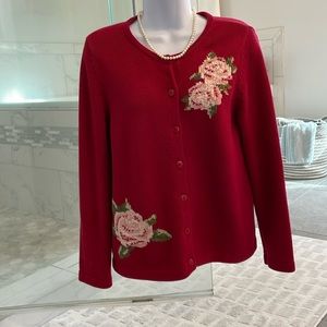 Think Christmas!  Beautiful red sweater with pink embroidered flowers